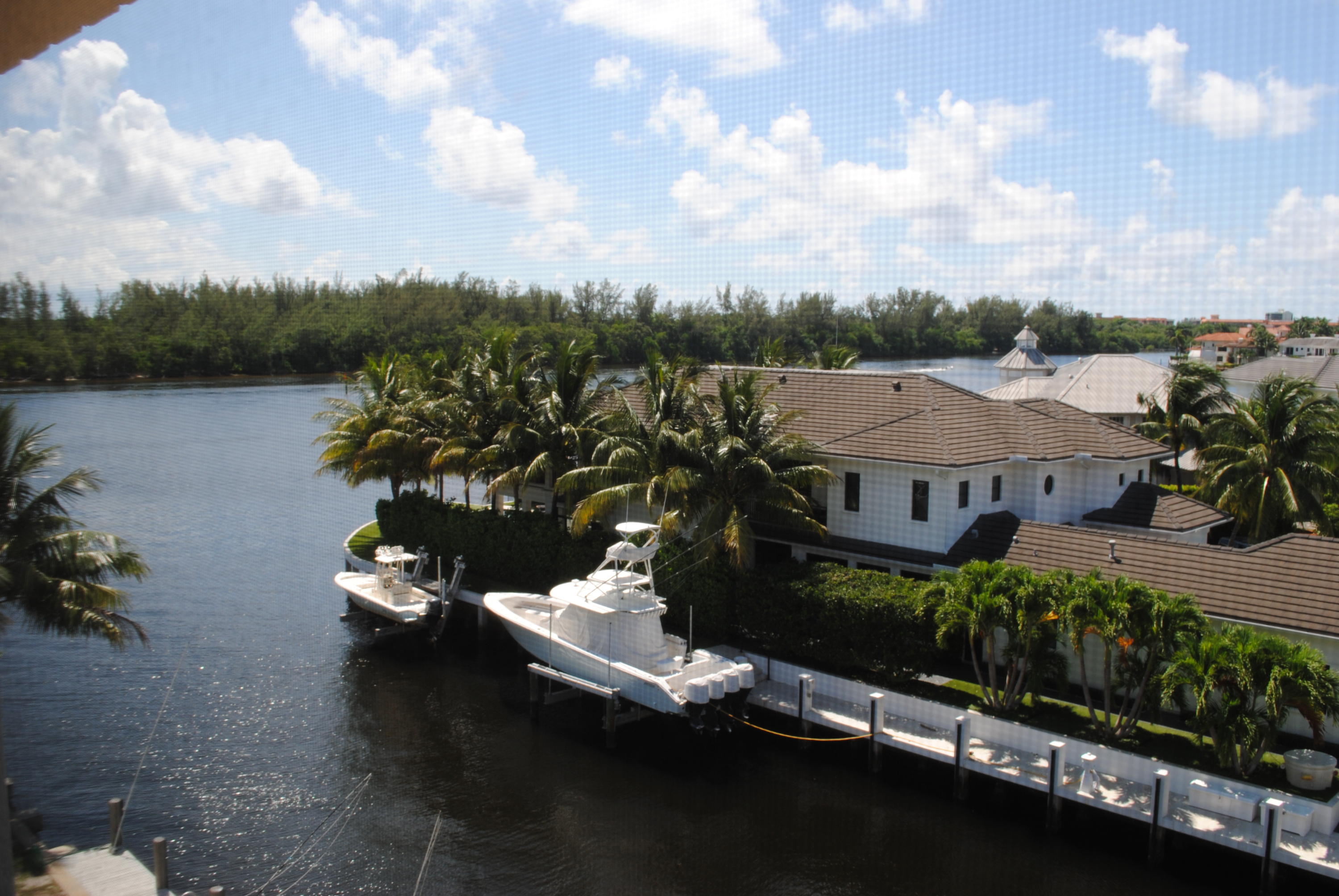 750 Northeast Spanish River Boulevard, Unit 503 Boca Raton, FL 33431 - Photo 32 of 32 an aerial view of a house with a lake view