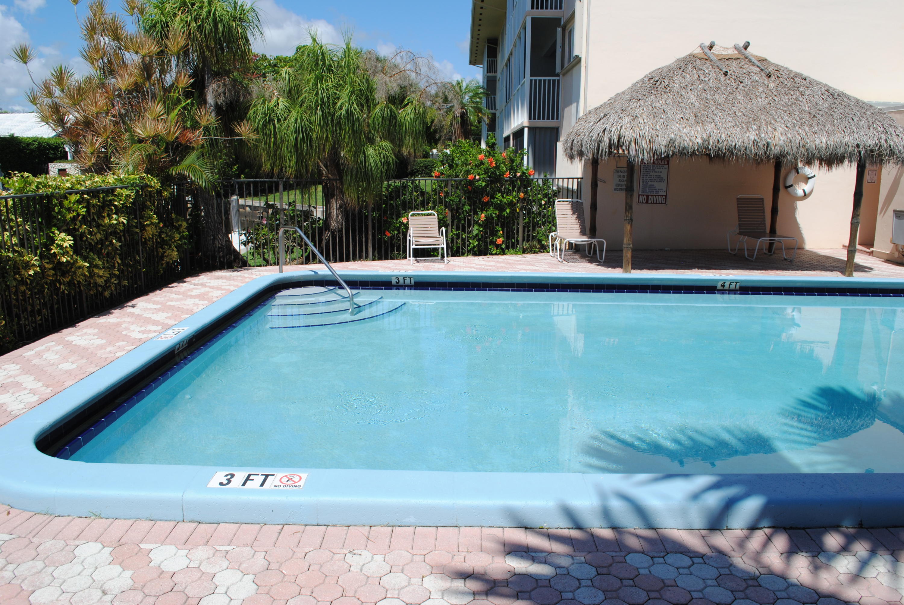 750 Northeast Spanish River Boulevard, Unit 503 Boca Raton, FL 33431 - Photo 8 of 32 a view of a back yard