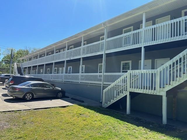 432 4th Avenue Dalton, GA 30721 - Photo 11 of 25 a view of a house with a deck