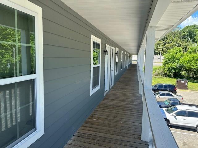 432 4th Avenue Dalton, GA 30721 - Photo 15 of 25 a view of a balcony with wooden floor