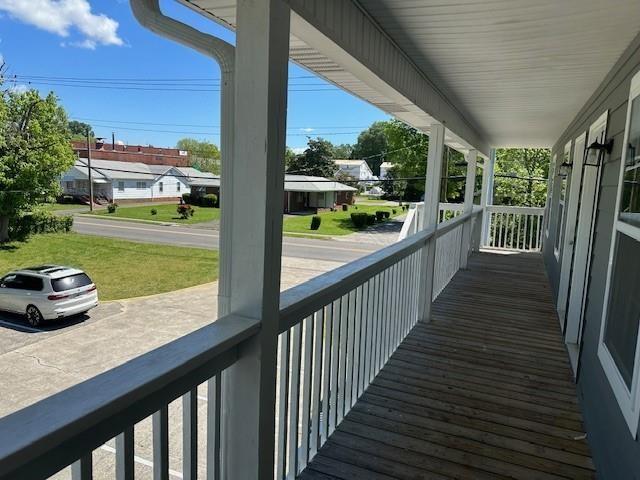 432 4th Avenue Dalton, GA 30721 - Photo 16 of 25 a view of a porch with furniture and garden