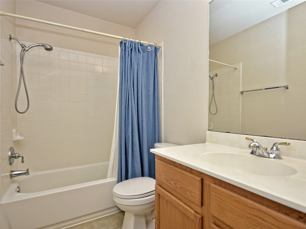 3600 Spring Canyon Trail Round Rock, TX 78681 - Photo 20 of 30 a bathroom with a sink toilet and shower