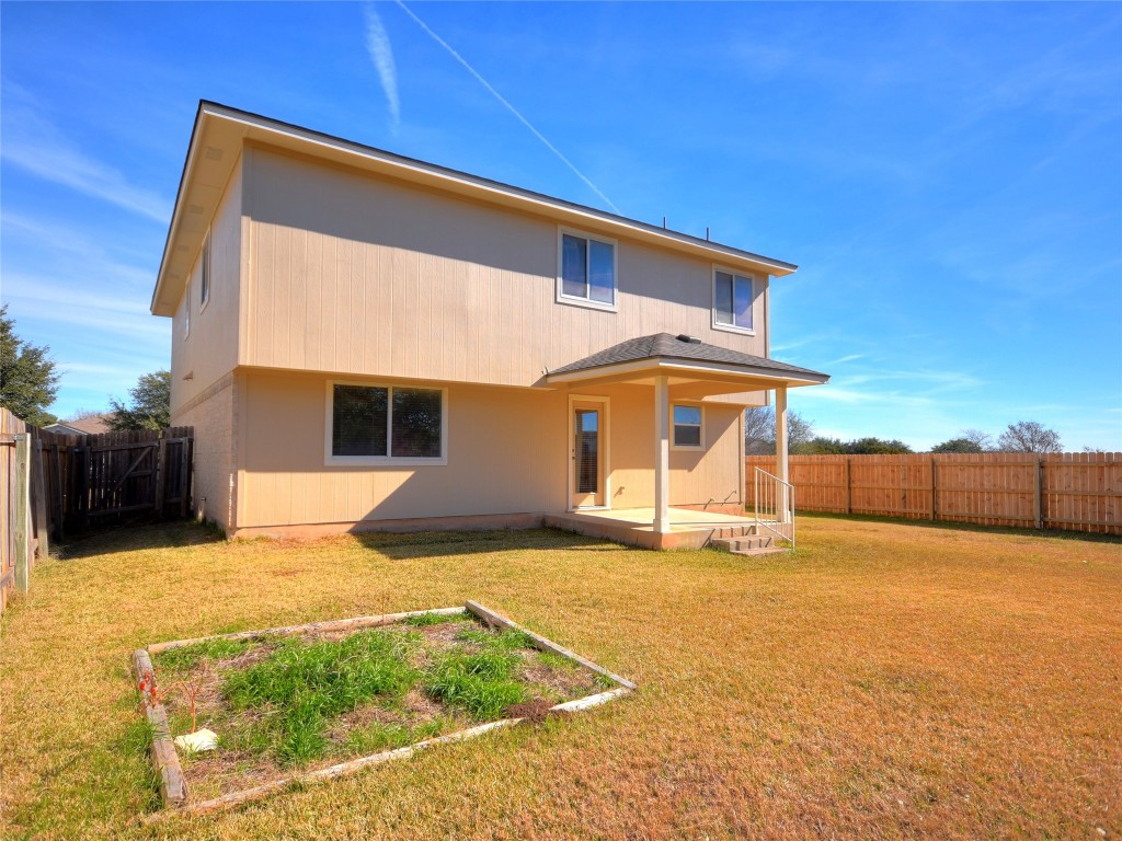 3600 Spring Canyon Trail Round Rock, TX 78681 - Photo 25 of 30 a front view of a house with a yard