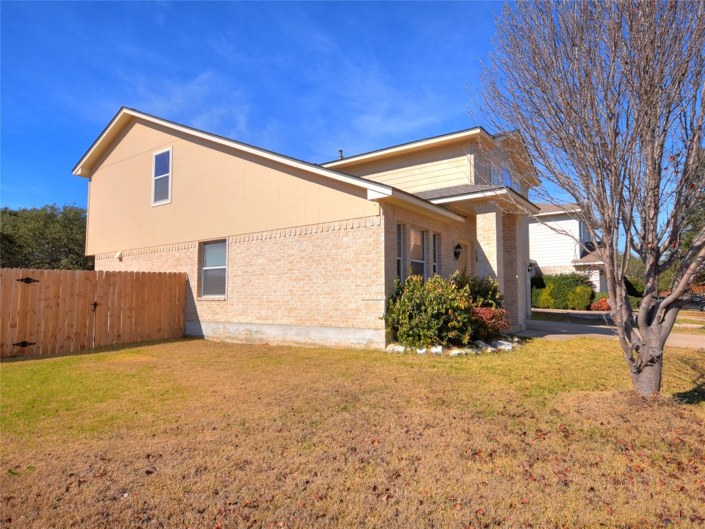 3600 Spring Canyon Trail Round Rock, TX 78681 - Photo 3 of 30 a view of a house with a big yard