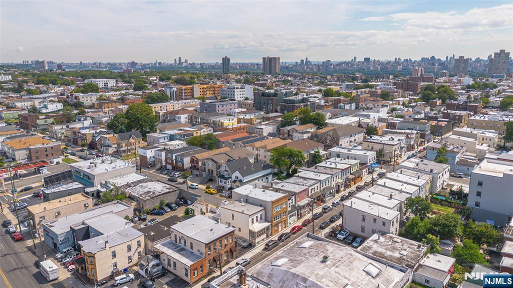598 67th Street, Unit 1 West New York, NJ 07093 - Photo 5 of 22 an aerial view of a city with lots of residential buildings
