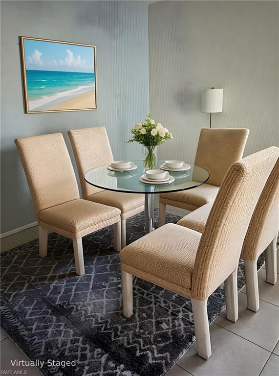 103 Teryl Road, Unit A4 Naples, FL 34112 - Photo 3 of 14 Virtually staged dining area