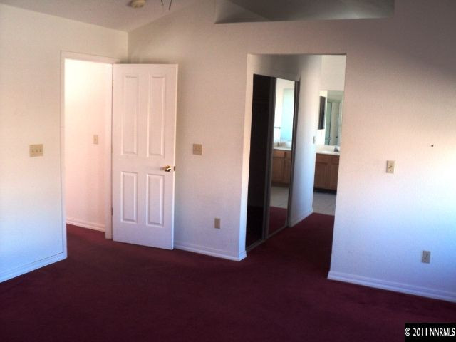 2979 Aspendale Drive Reno, NV 89503 - Photo 7 of 13 an empty room with windows