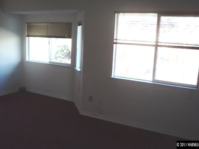 2979 Aspendale Drive Reno, NV 89503 - Photo 8 of 13 an empty room with a window