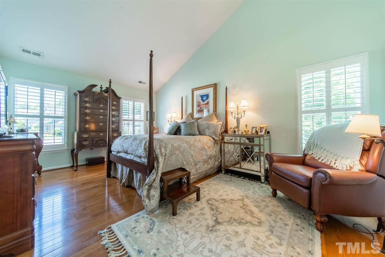 10001 Duval Street Raleigh, NC 27614 - Photo 7 of 19 Owner's retreat with hardwood floors and vaulted ceilings! Check out the custom WIC!