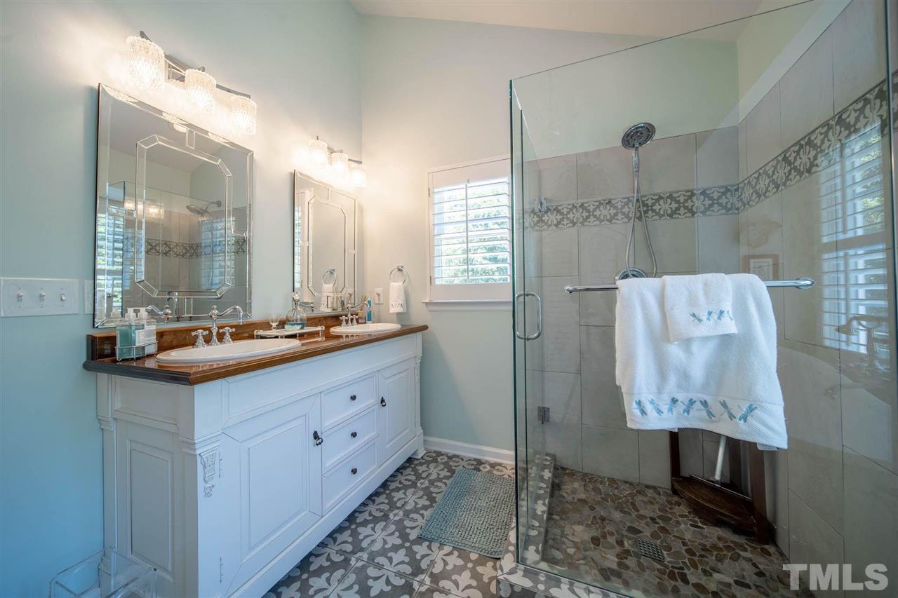 10001 Duval Street Raleigh, NC 27614 - Photo 8 of 19 This bath was made for some good R&R! Soak in the claw foot tub or rinse away your worries in the tile walk in shower!