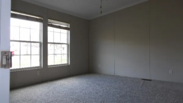 an empty room with a window