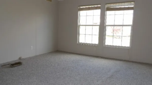 an empty room with a window