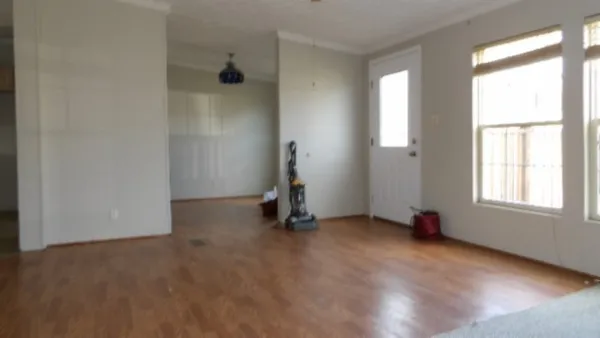 an empty room with windows