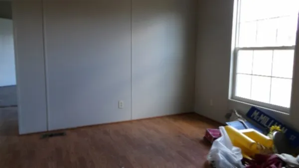 an empty room with windows