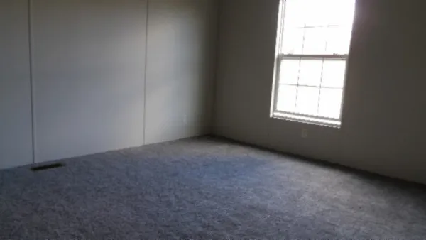 an empty room with a window