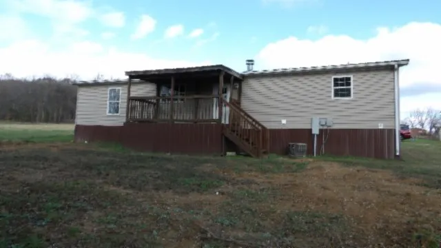 a view of backyard of house