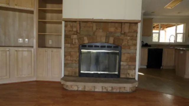 a living room with a fireplace