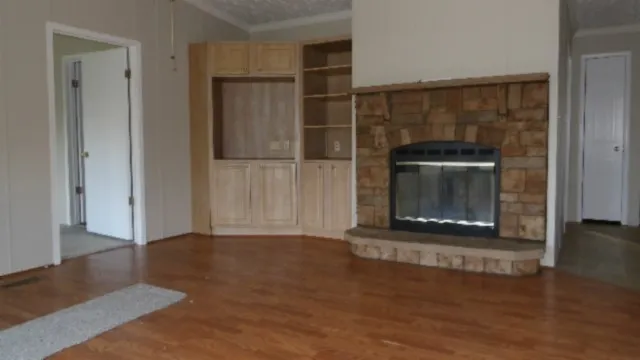 a living room with a fireplace
