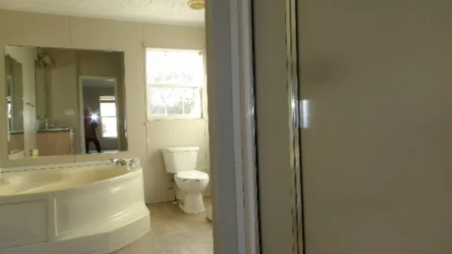 a bathroom with a bathtub and sink