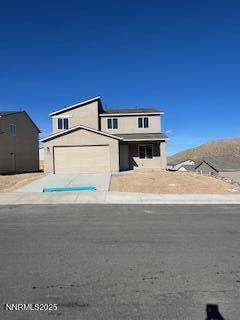 8465 Endor Drive, Unit LOT 87 Reno, NV 89506 - Photo 5 of 5 a front view of a house with a yard