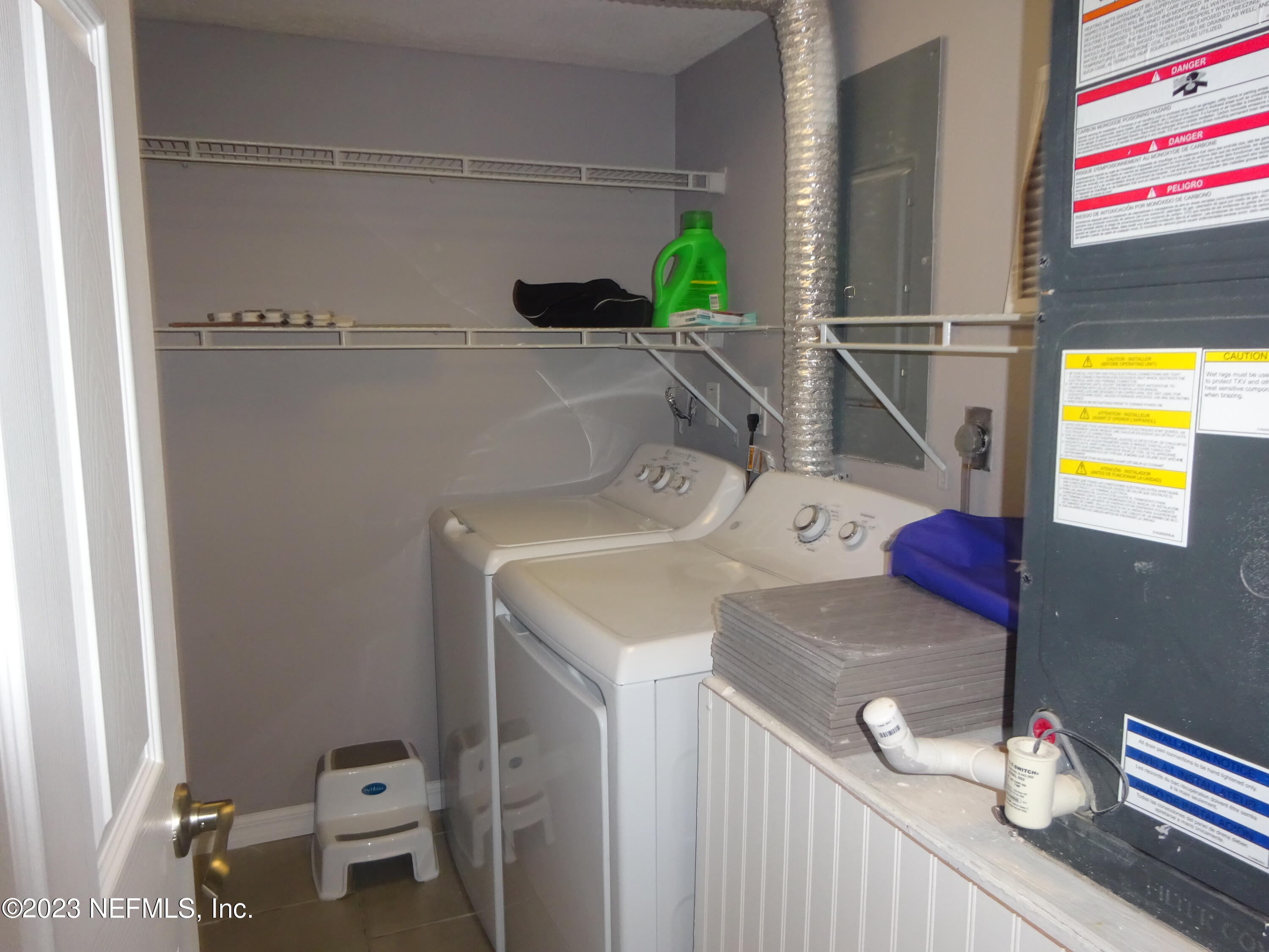 7175 A1A South, Unit F141 St. Augustine, FL 32080 - Photo 18 of 36 a bathroom with a sink and a mirror