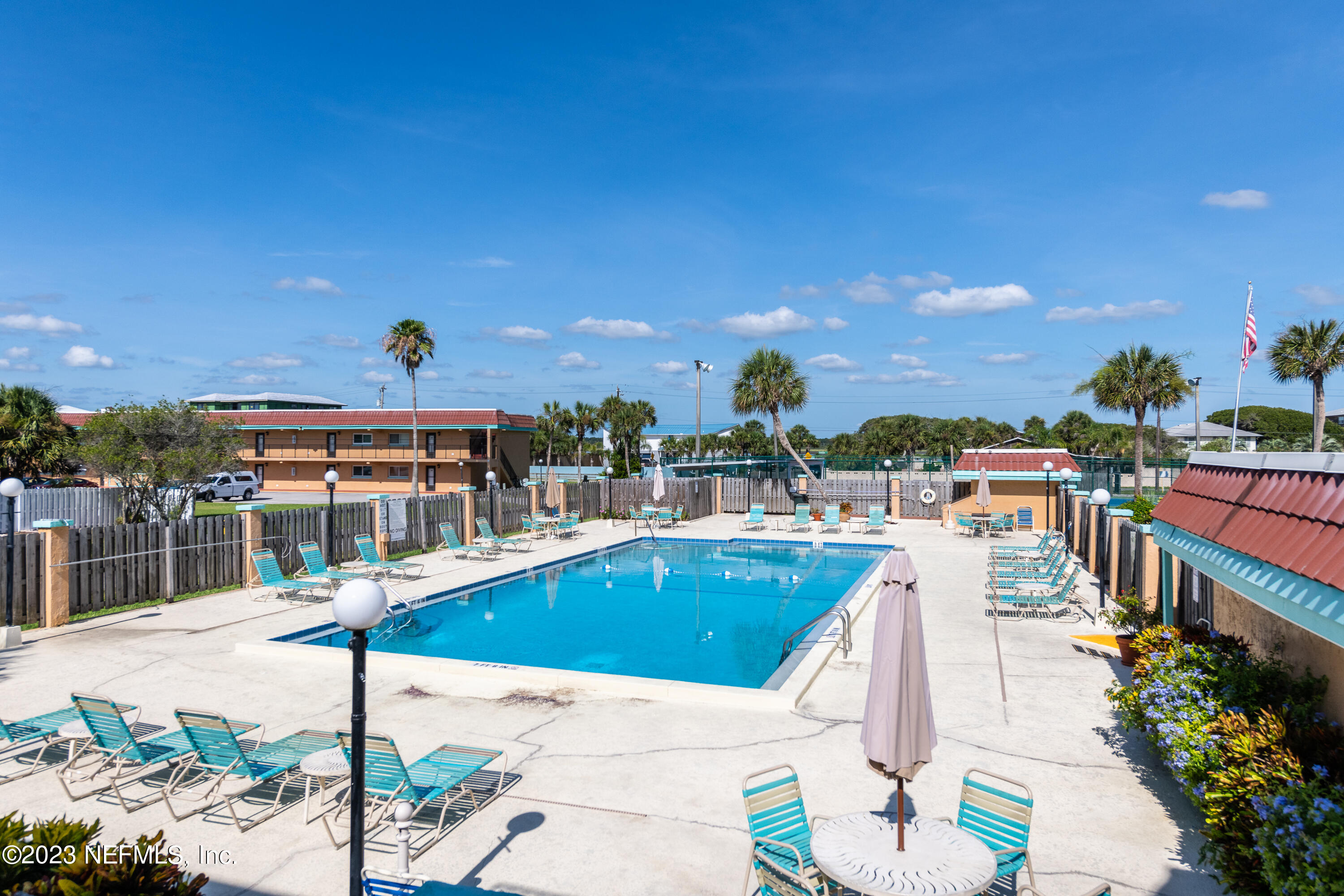 7175 A1A South, Unit F141 St. Augustine, FL 32080 - Photo 20 of 36 a view of a swimming pool with a patio