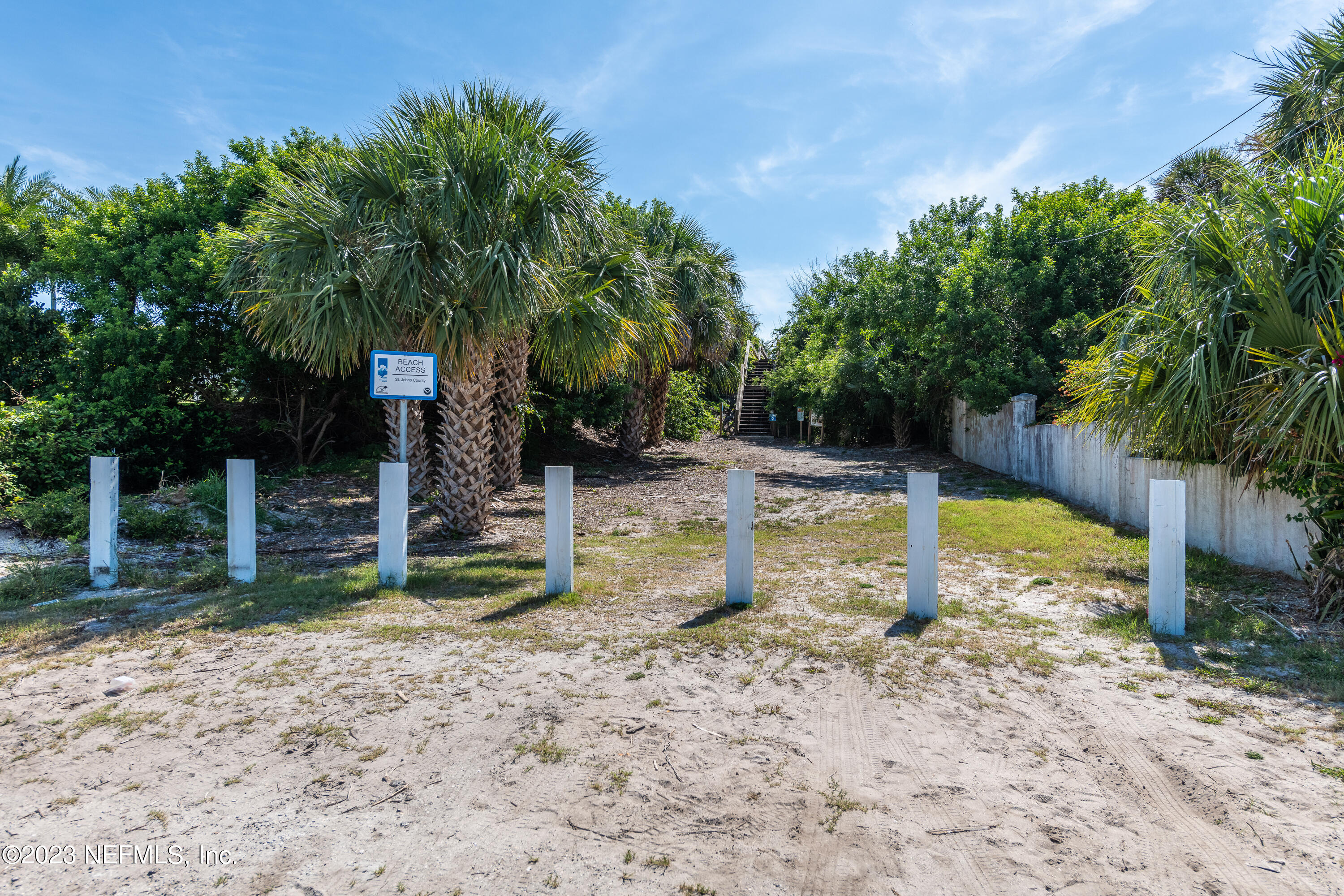 7175 A1A South, Unit F141 St. Augustine, FL 32080 - Photo 29 of 36 a view of a yard with palm tree