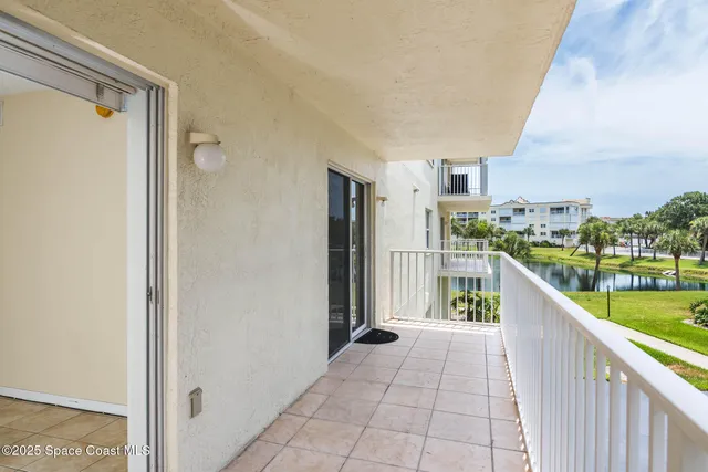 a view of a balcony with city view