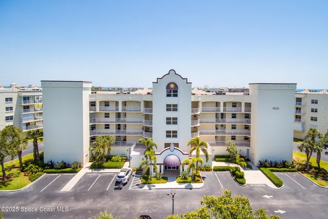 a front view of building with outdoor seating