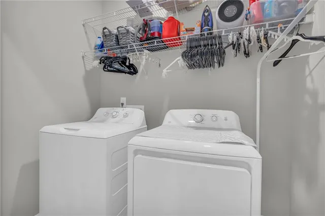 a utility room with dryer and washer