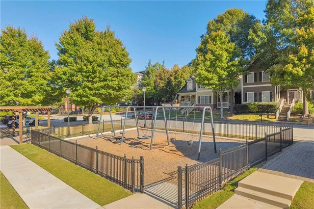 a view of a swimming pool with a patio