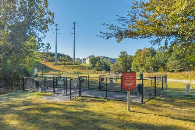 a view of swimming pool with chairs