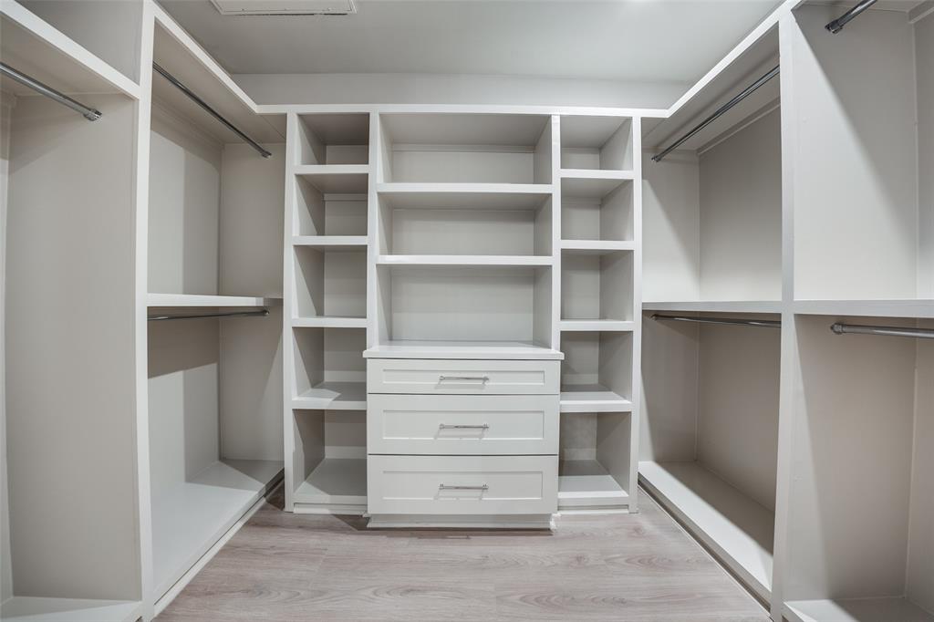 1900 South Ervay Street, Unit 512 Dallas, TX 75215 - Photo 11 of 22 a view of walk in closet with empty racks