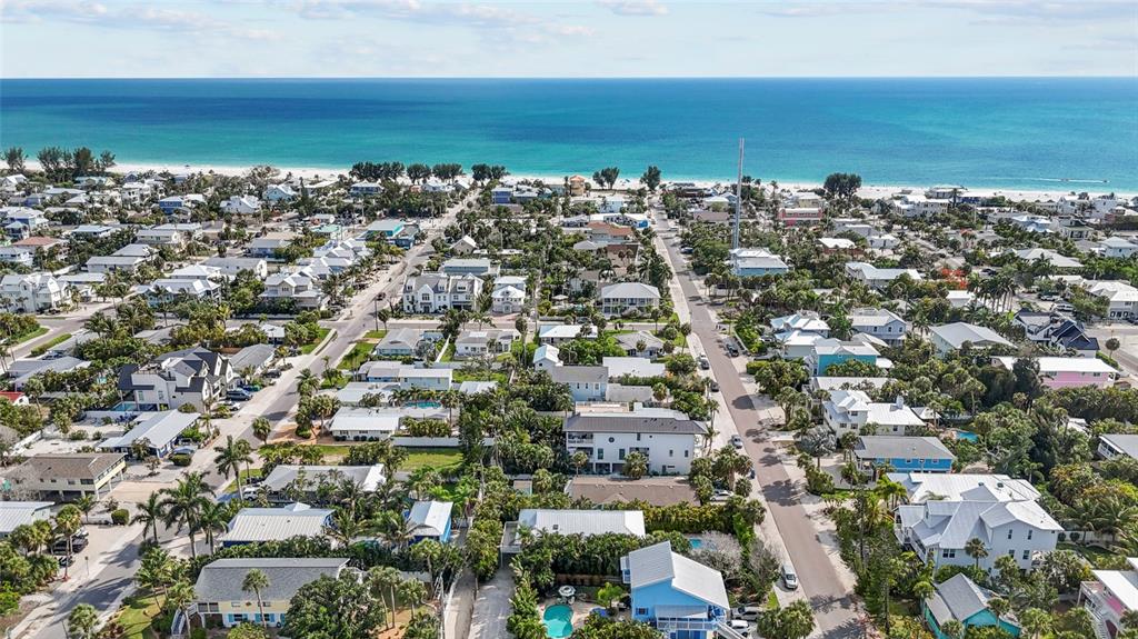 315 Spring Avenue Anna Maria, FL 34216 - Photo 52 of 63 an aerial view of a city with ocean view