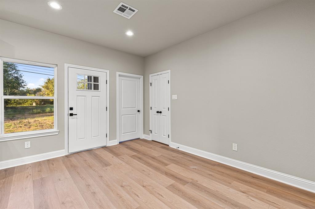 2913 Mildred Street Waco, TX 76706 - Photo 12 of 33 Foyer featuring light wood finished floors and recessed lighting