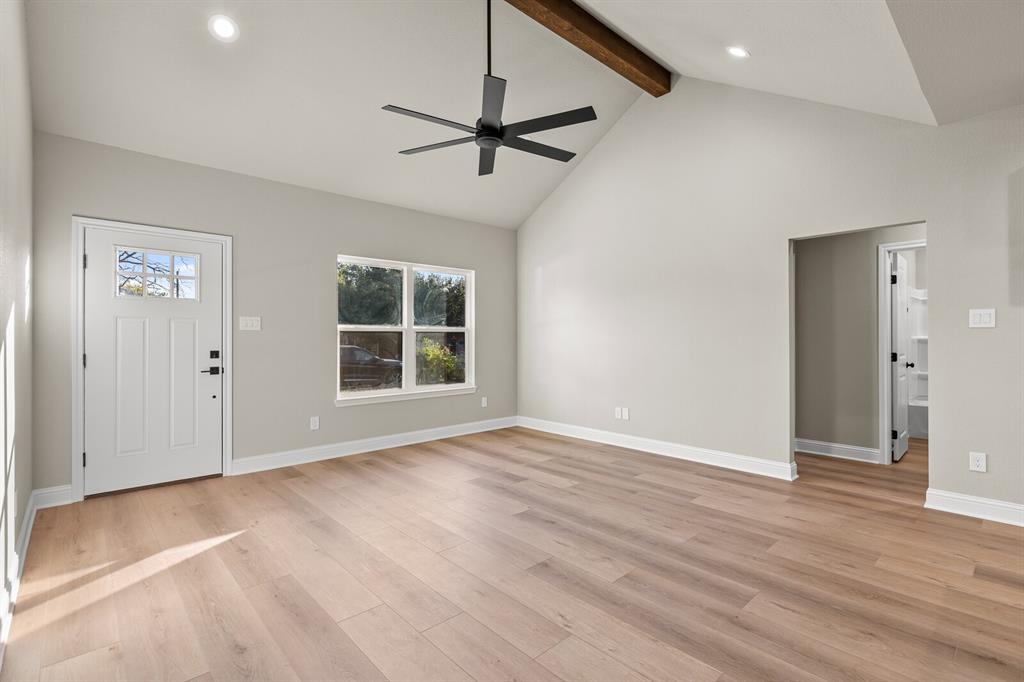 2913 Mildred Street Waco, TX 76706 - Photo 7 of 33 Entrance foyer with beam ceiling, light wood finished floors, plenty of natural light, high vaulted ceiling, and recessed lighting