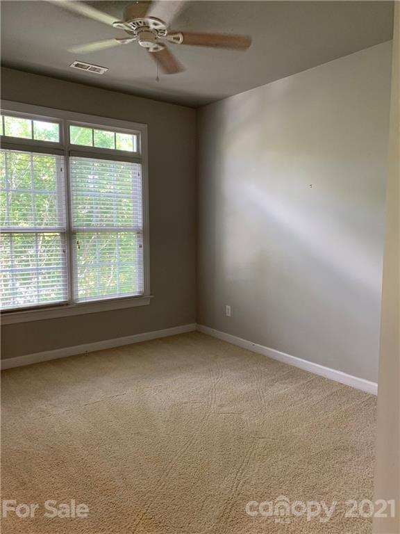 3081 River Bend Drive Tega Cay, SC 29708 - Photo 14 of 15 an empty room with a window