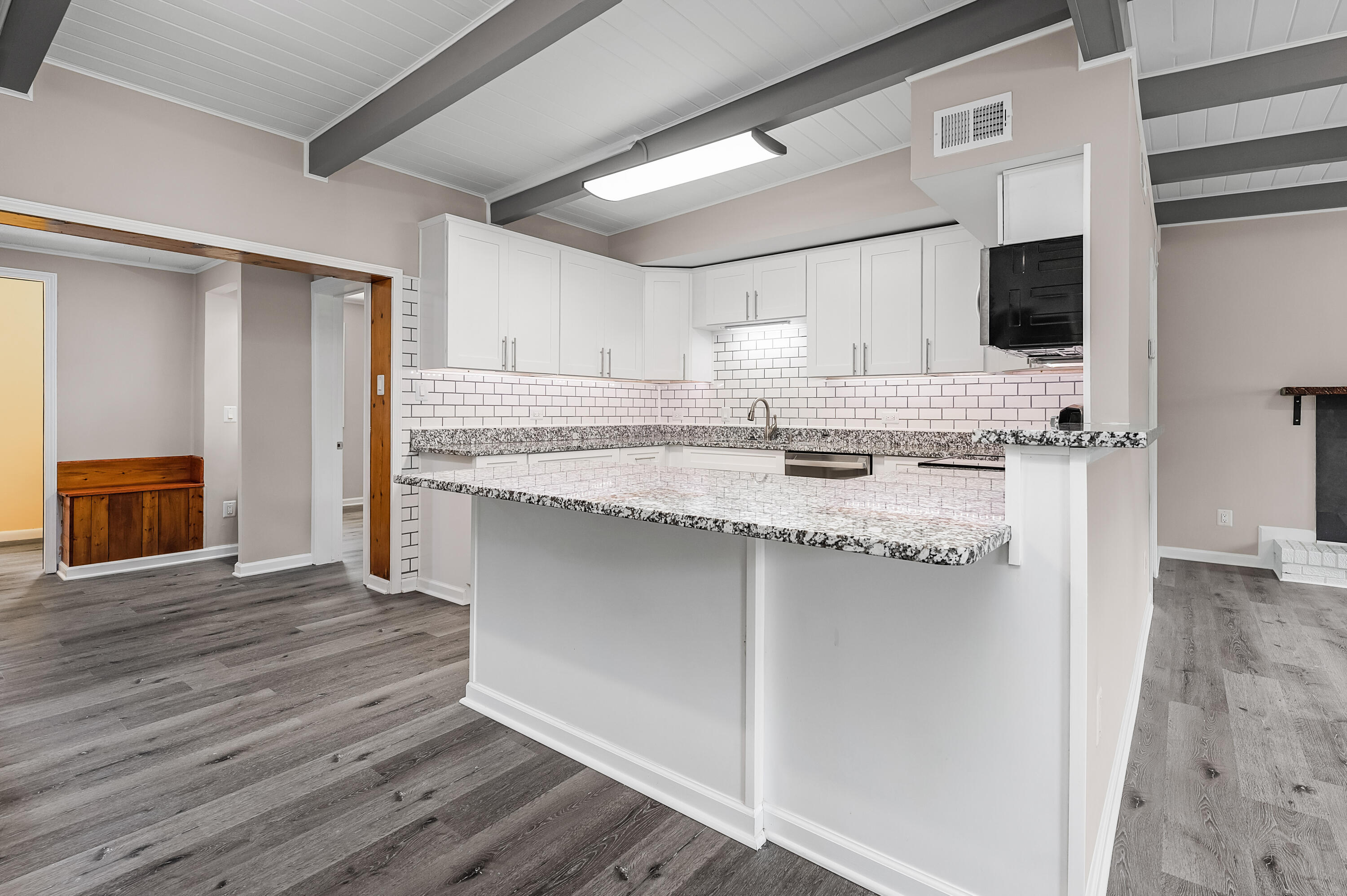 413 Gerold Street Fort Walton Beach, FL 32547 - Photo 16 of 91 a kitchen with stainless steel appliances granite countertop a sink stove and microwave