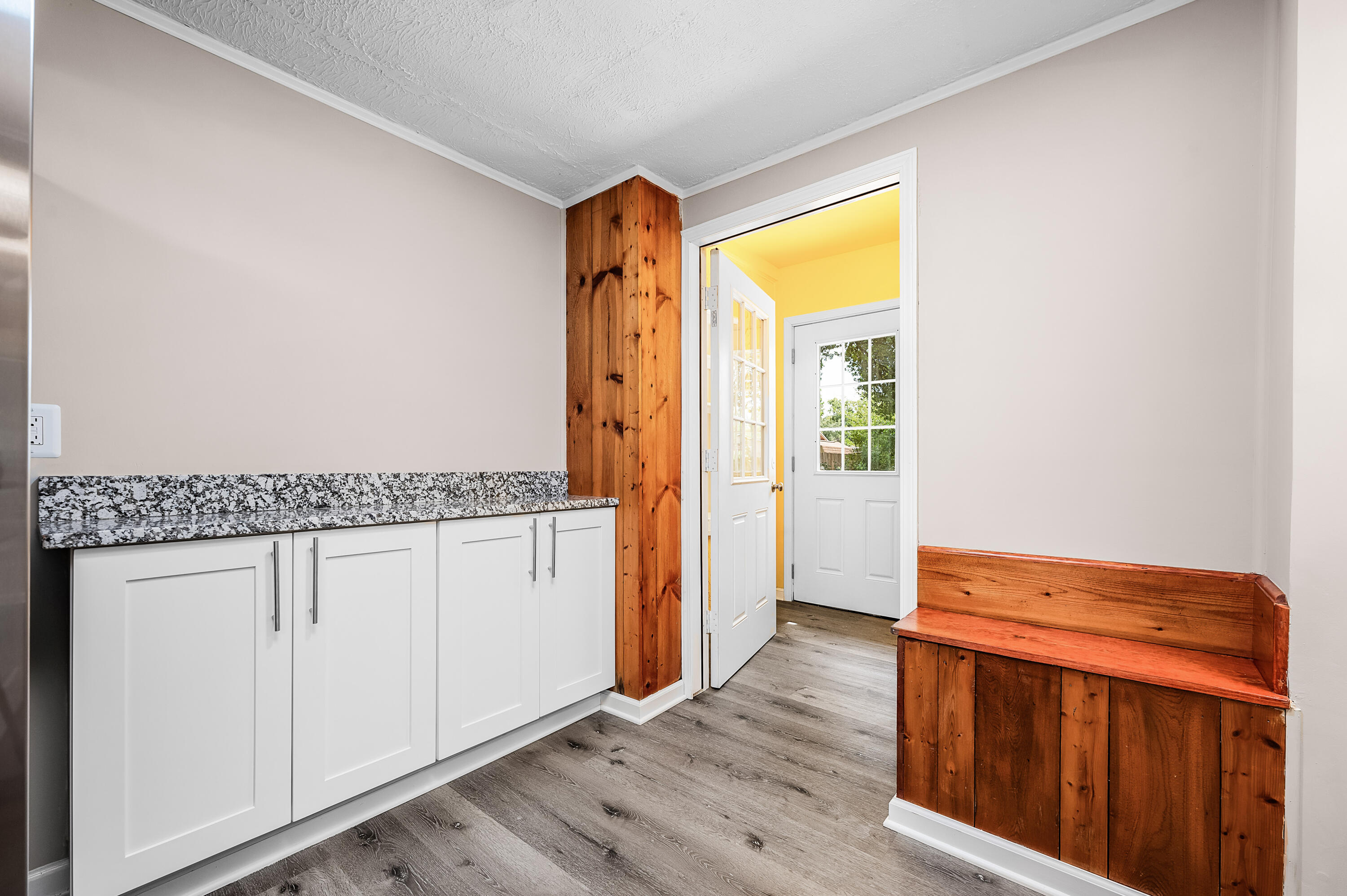 413 Gerold Street Fort Walton Beach, FL 32547 - Photo 27 of 91 a view of a kitchen with wooden floor and electronic appliances