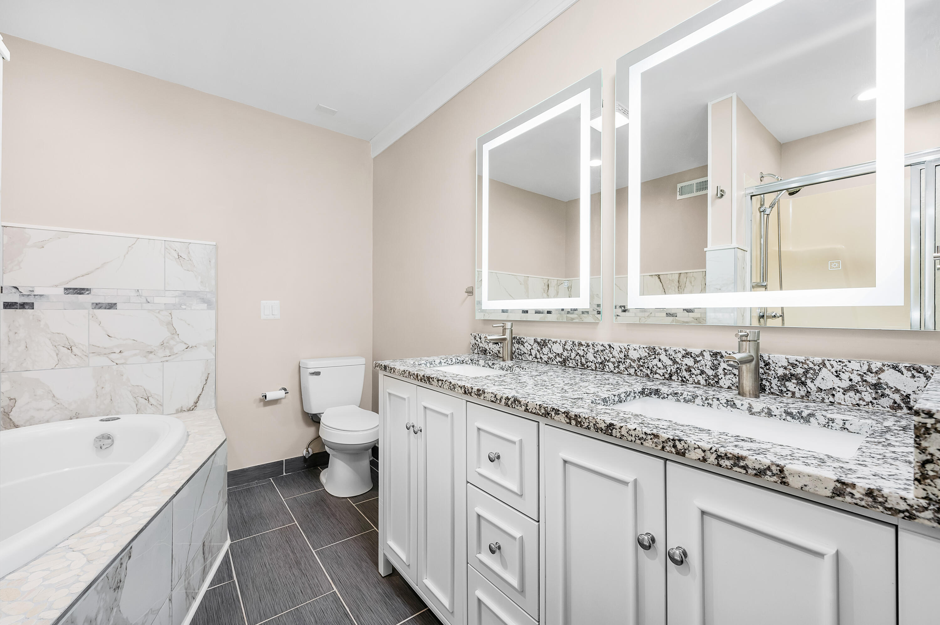 413 Gerold Street Fort Walton Beach, FL 32547 - Photo 36 of 91 a bathroom with a granite countertop sink a toilet and bathtub