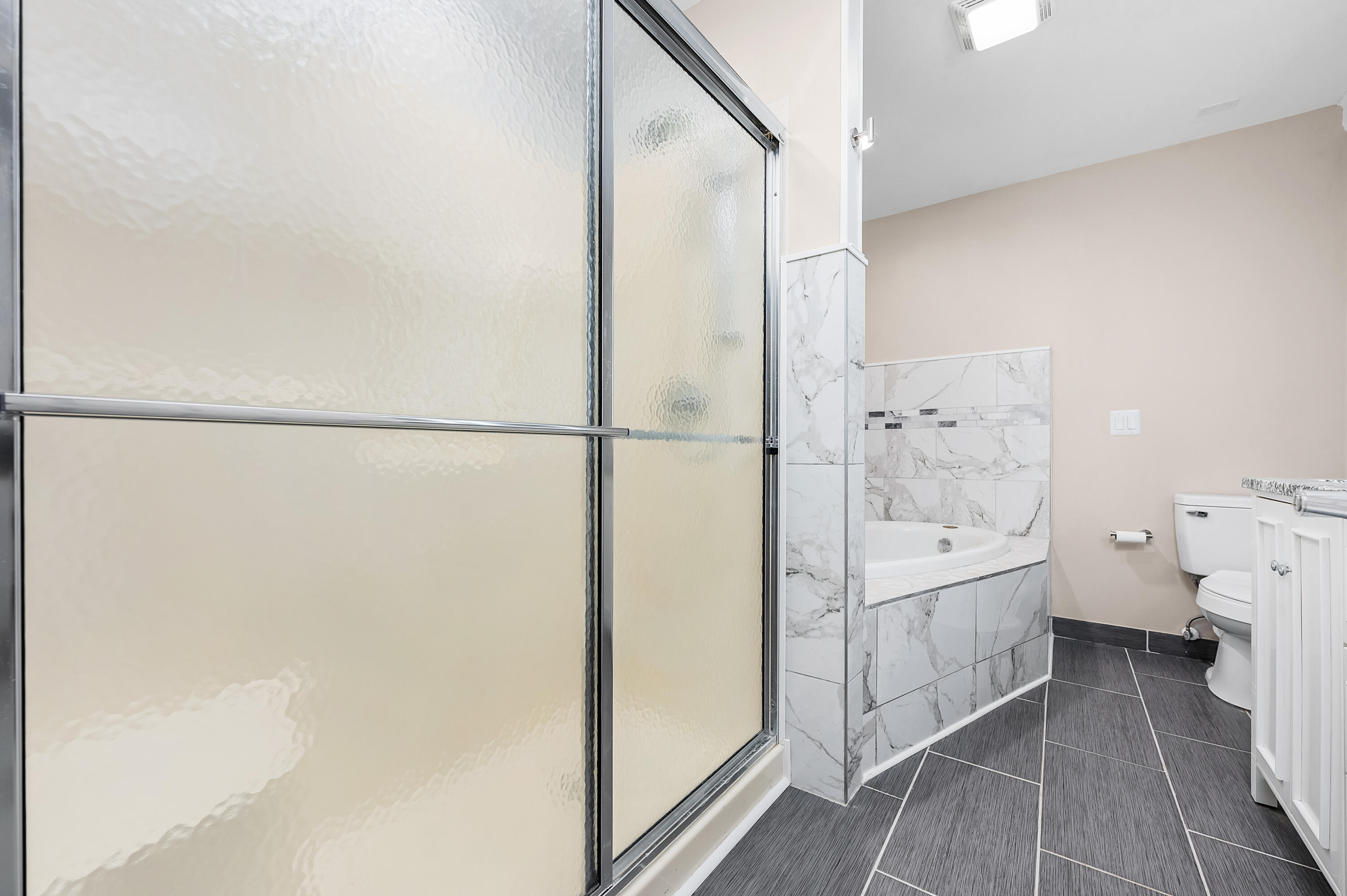 413 Gerold Street Fort Walton Beach, FL 32547 - Photo 39 of 91 a bathroom with a bathtub and a shower