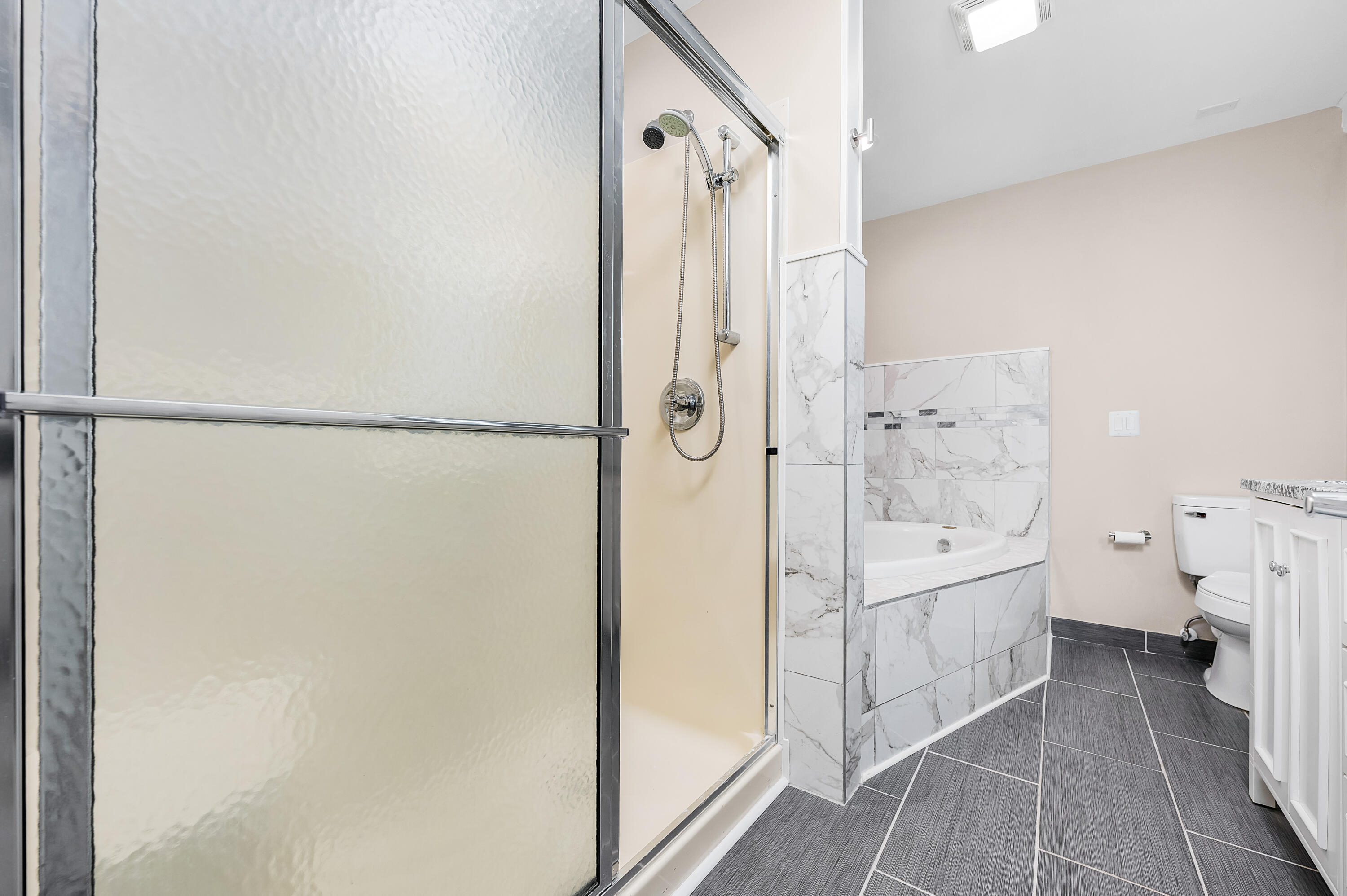 413 Gerold Street Fort Walton Beach, FL 32547 - Photo 40 of 91 a bathroom with a bathtub and a shower