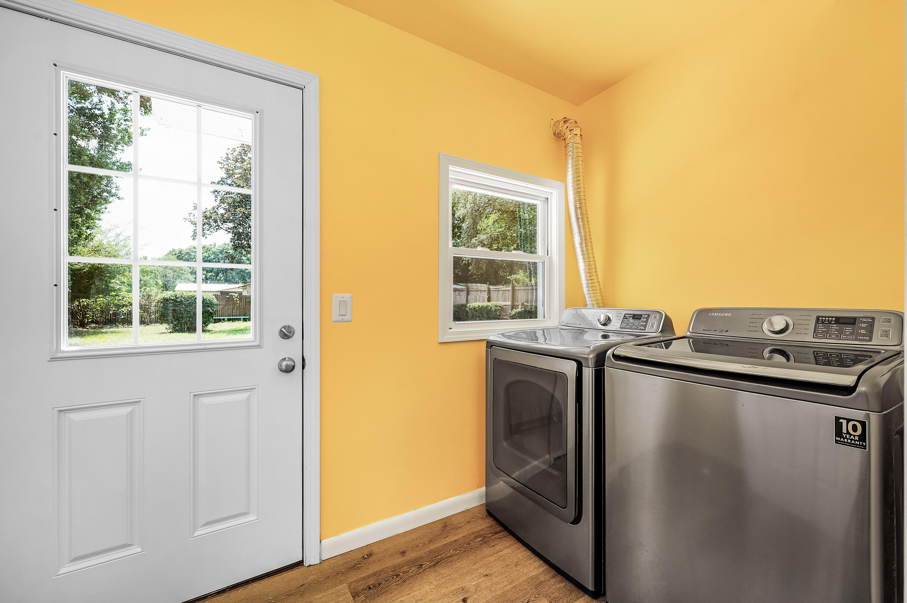413 Gerold Street Fort Walton Beach, FL 32547 - Photo 62 of 91 a view of a kitchen with appliances and wooden floor