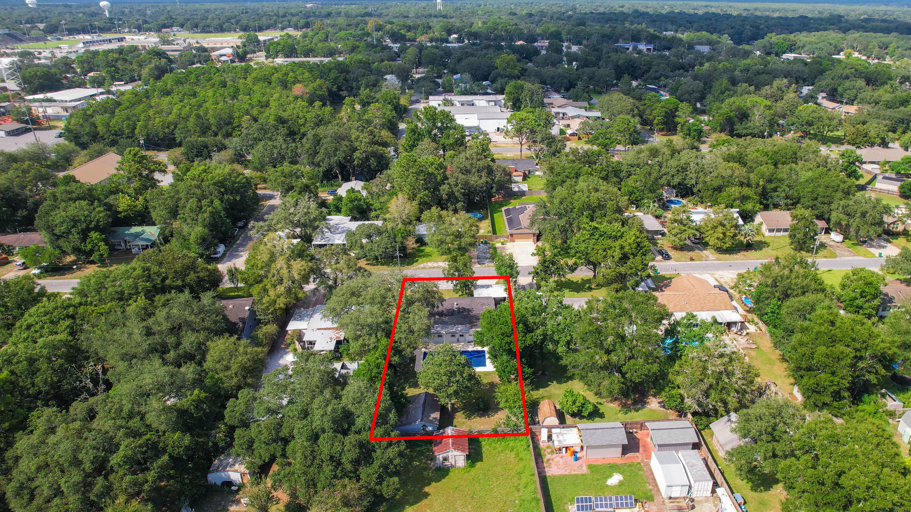 413 Gerold Street Fort Walton Beach, FL 32547 - Photo 83 of 91 an aerial view of residential houses with outdoor space and trees