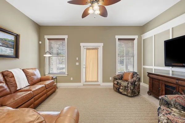 a living room with furniture and a window