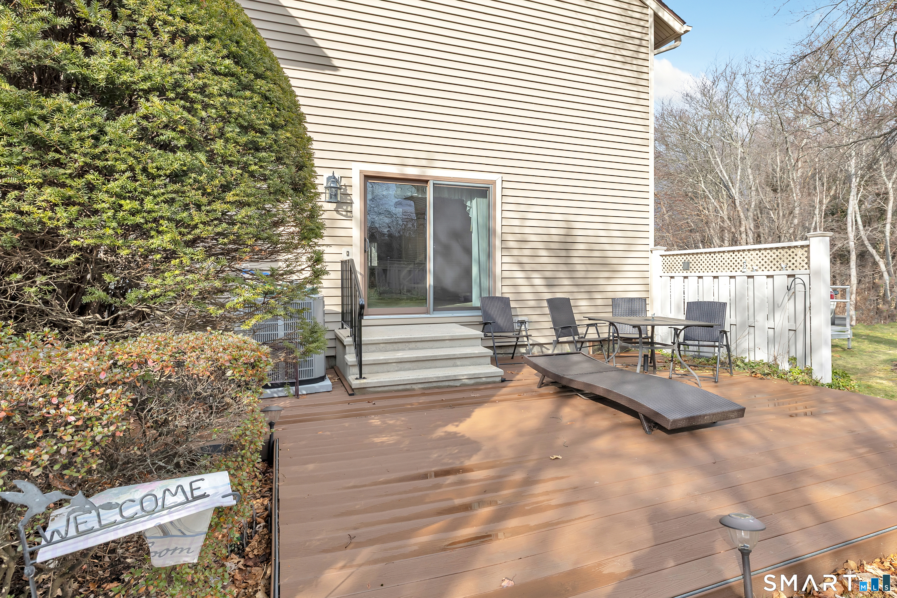 330 Merwin Avenue, Unit 1D Milford, CT 06460 - Photo 34 of 39 a view of a patio with chairs and potted plants