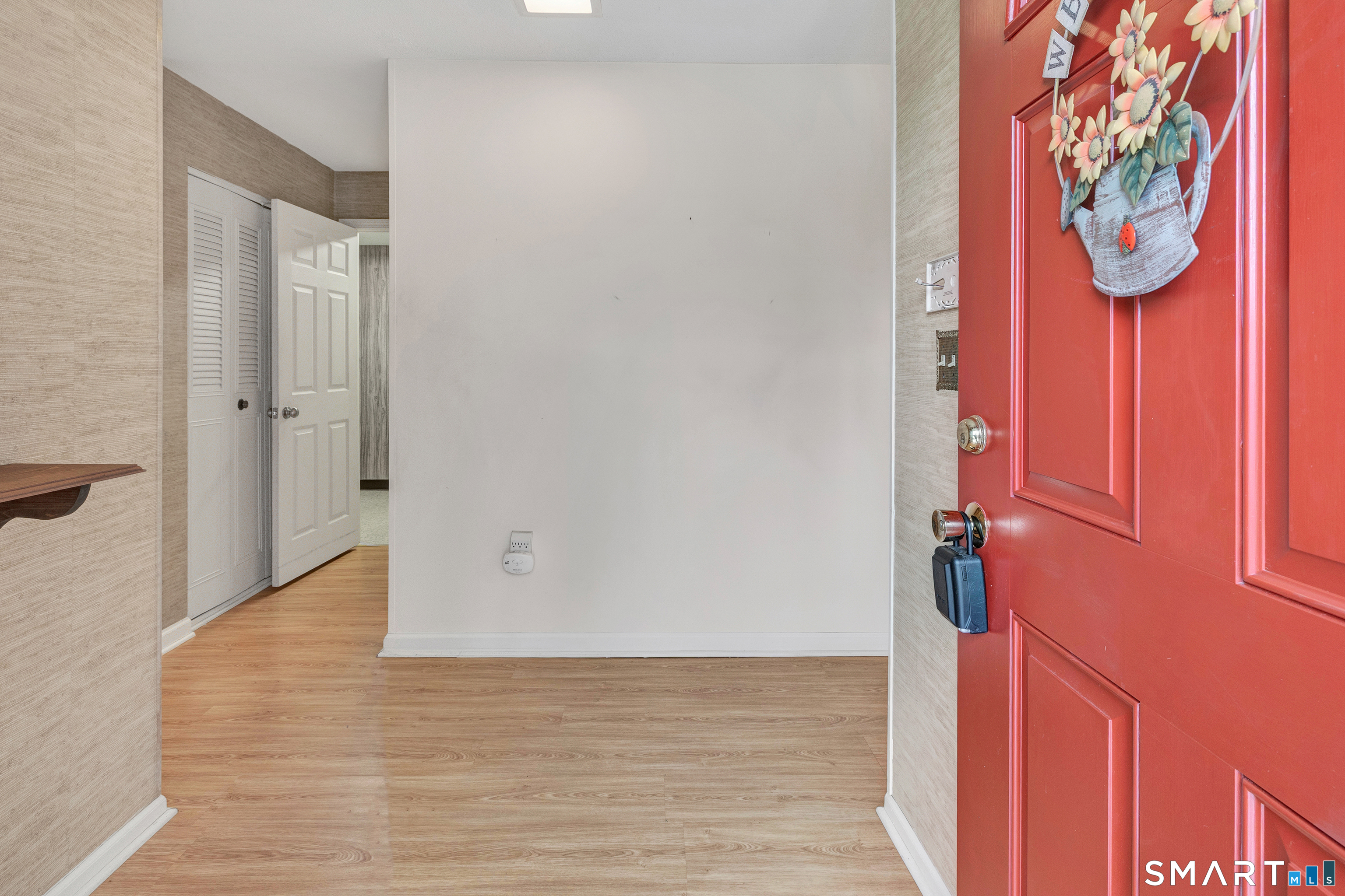 330 Merwin Avenue, Unit 1D Milford, CT 06460 - Photo 5 of 39 a view of an entryway with wooden floor