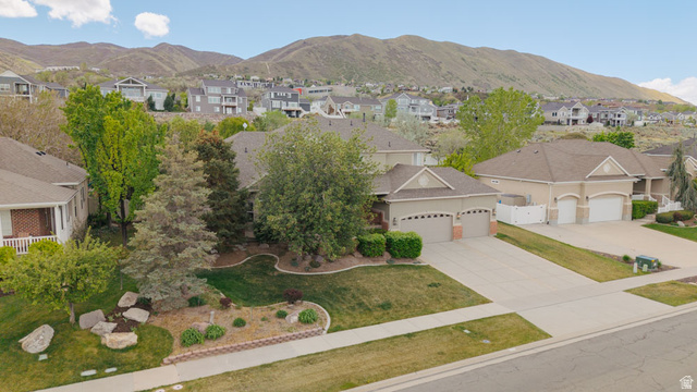 598 Hollow Creek Road Draper, UT 84020 - Photo 12 of 110 Two-story residence with a two-car garage and a paved driveway