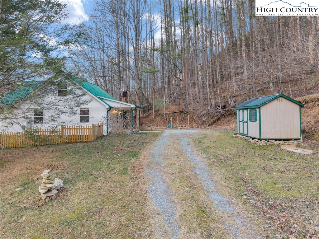 295 Jake's Mountain Road Boone, NC 28607 - Photo 4 of 47 a backyard of a house