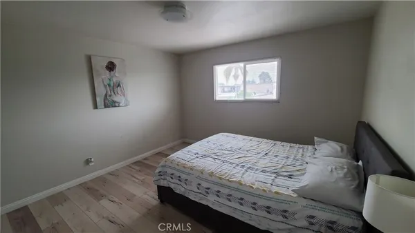 a bathroom with a sink mirror and toilet